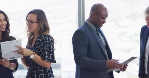 Business People Collaborating in a Bright Urban Office