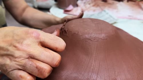 Working With Clay In Ceramic Workshop 7