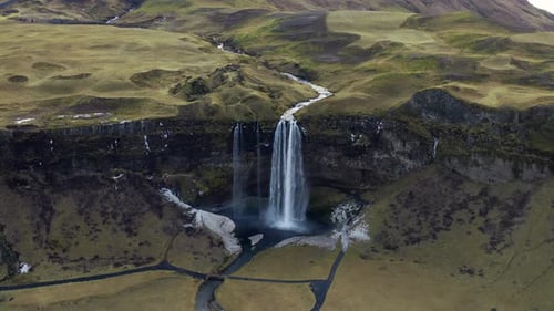 Seljalandsfoss Waterfall In Landscape In Iceland