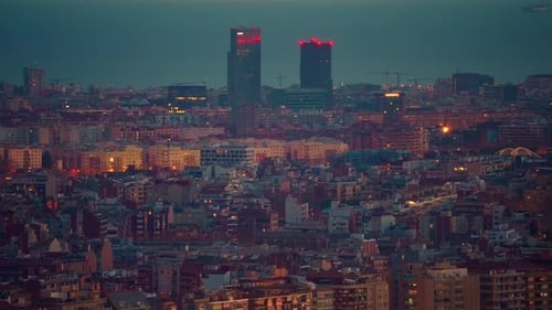 Establishing Shot of Barcelona Skyline From West to East Barcelona City Streets Illuminated and