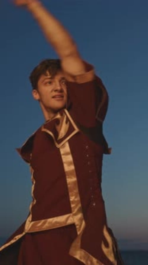 Man Juggling with Fire at Night Show