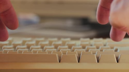 Typing on Old Computer Keyboard, Close Up