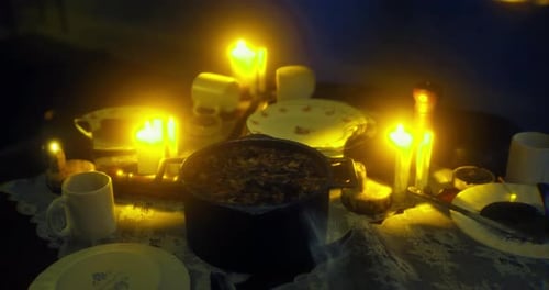 Cozy Evening Meal with Warm Candlelight