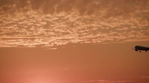 Airliner Against Sunset Background