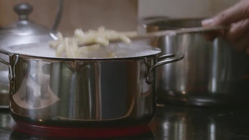 Cooking Pasta in a Pot of Boiling Water