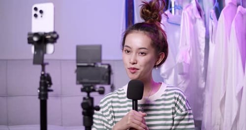 Live streaming event with enthusiastic host in home studio setting engaging content creation