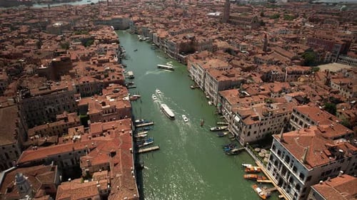 Aerial Drone Fly Above Boats Sailing in Grand Canal of Venice, Italy in Summer Warm Weather, Gondola