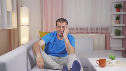 Man thinking of sad and sad memories.