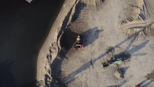 Aerial Top View of Trucks and Machinery in the Sand Quarry