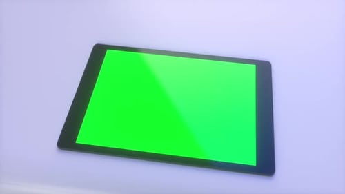 Digital Tablet with Green Screen for Mockup on White Desk - Chroma Key Display