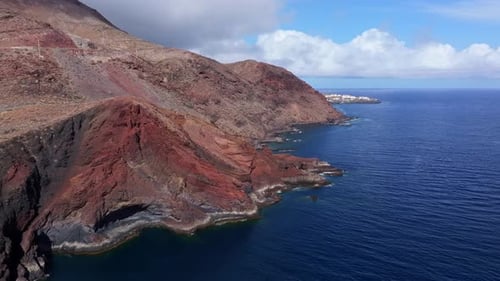 Rugged Coastal Cliffs - Majestic Red Rocks and Blue Ocean Horizon Landscapes