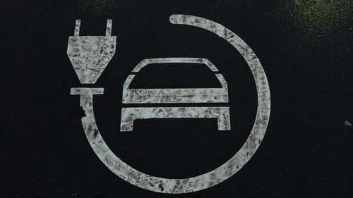 Electric Vehicle Charging Station Symbol on Pavement