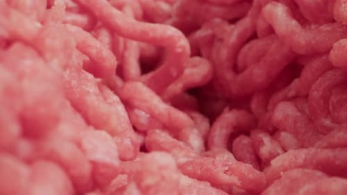 Raw Minced Meat Macro Probe Lens Beef or Pork Red Minced Burger Meat Close Up Tunnel Rotation