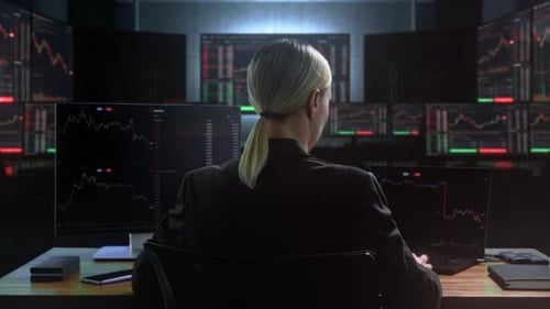 Female Investor Concentrates Intensely On Multiscreen Trading Data Late At Night When Assessing Risk