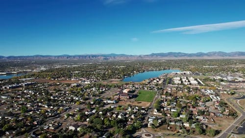 Drone aerial view of a nice suburb outside of Denver, CO with a lake