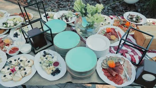 A Buffet Table with Snacks at a Business Event in the Fresh Air Catering Serves the Banquet