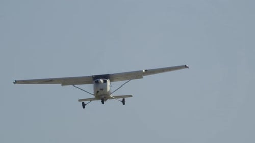 Small Singleengine Propeller Plane Flying