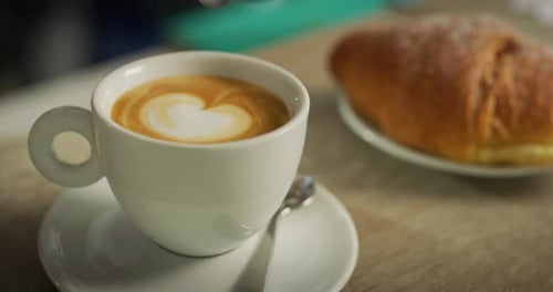 Pouring Milk into Coffee, Close Up