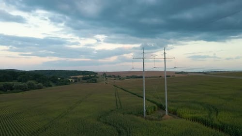 Tower with Electric Power Lines for Transfering High Voltage Electricity Located in Agricultural