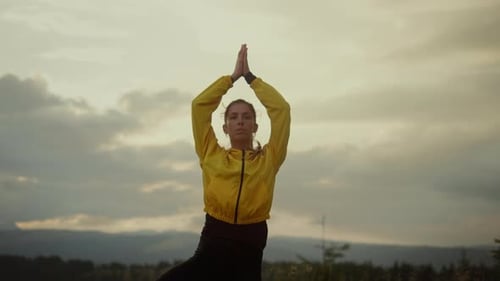 Front View Young Lady Performing Yoga in Tree Pose. Athletic Girl Doing