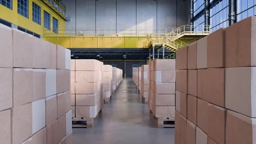 Warehouse Interior with Cardboard Boxes on Pallets