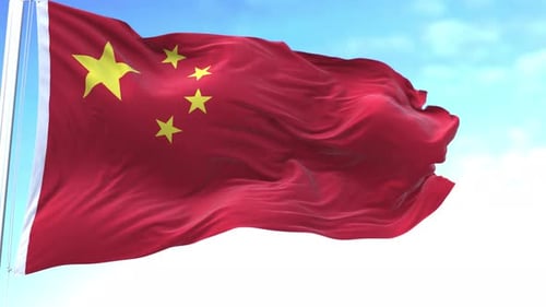 Realistic Chinese Flag Waving Against Blue Sky