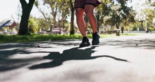 Feet, fitness and jump rope at park with training for wellness, balance