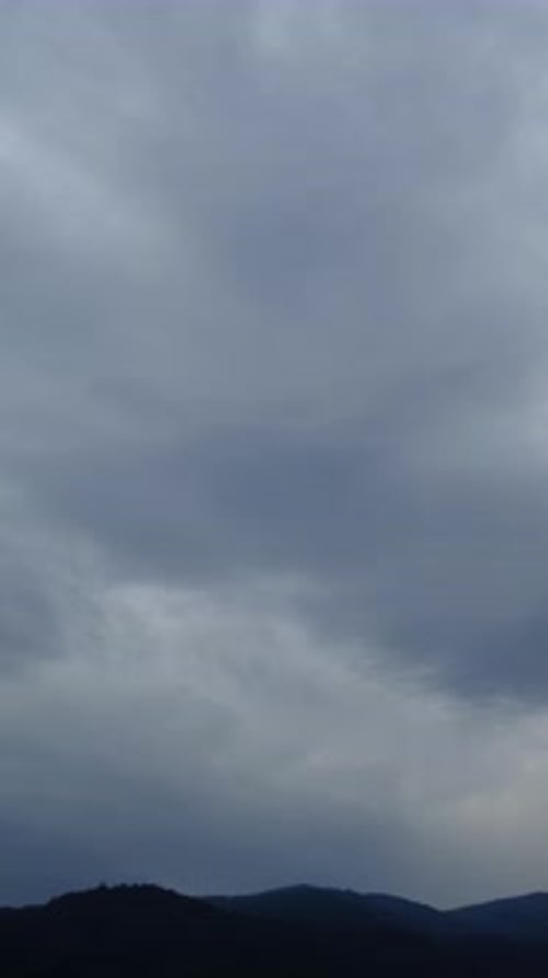 Moody Sky over Mountains Landscape
