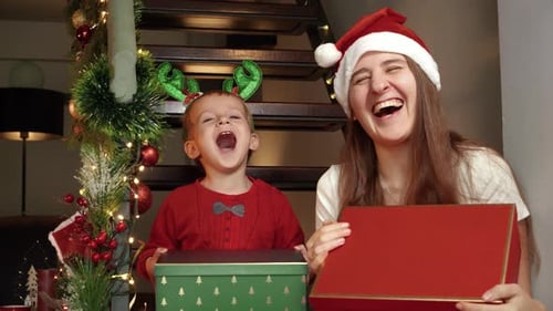 Festive Christmas Cheer: Family Gift Giving Moment