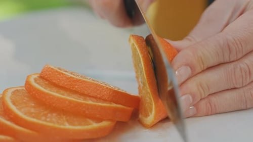 Juicy Orange Slices Cut with Sharp Knife