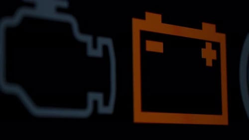 Illuminated Dashboard Icons on Dark Background