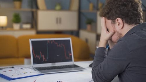 Trader losing money in the stock market.