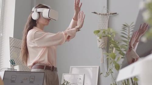 Woman Experiencing Virtual Reality in Office