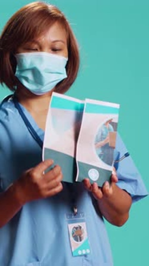 Nurse Presenting Medical Brochure