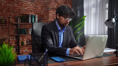 Business Professional Working in Modern Office Setting