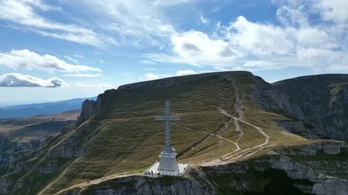 View of the Cross of Heroes on Mount Caraiman in the Bucegi Mountains, Romania