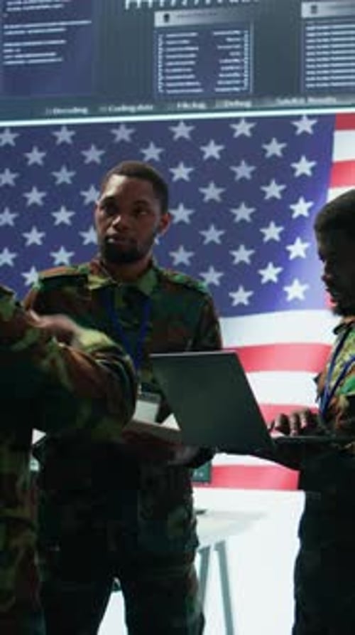 Team in Uniforms Collaborating on Operation