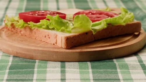 Making a Delicious Sandwich With Meat and Vegetables