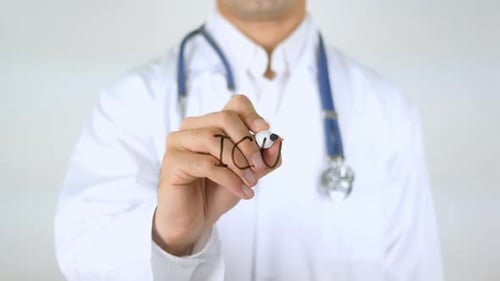 ICU Doctor Writing on Glass