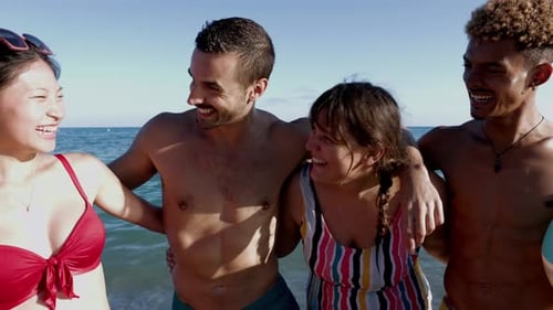 Diverse Group of Young Friends Having Fun on the Beach