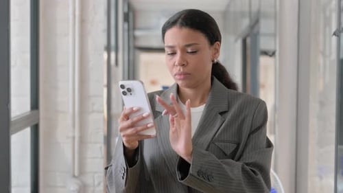 Portrait of African Businesswoman Using Phone