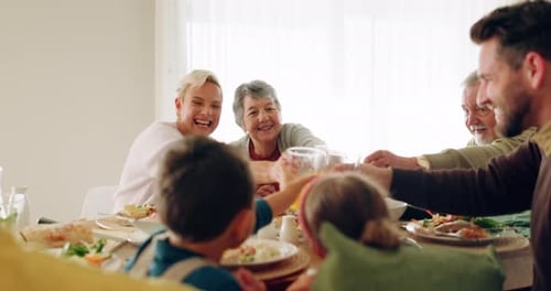Multigenerational Family Sharing a Meal Together