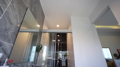 Modern Bathroom Interior with White Sink and Shower