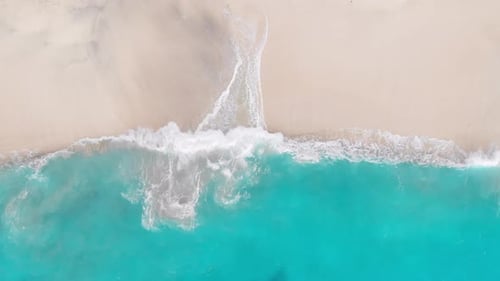 Tropical Beach with Turquoise Ocean Water and Waves Aerial View Top View of Paradise Island