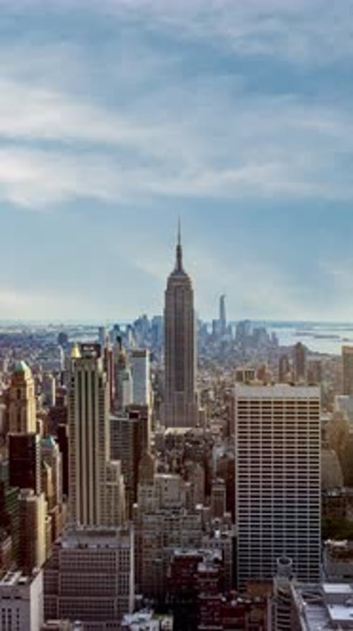 New York city skyline time lapse video from roof top with urban skyscrapers.