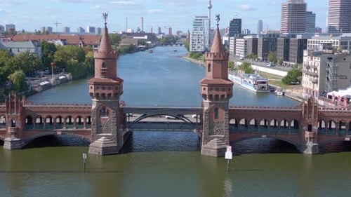 Summer day east west Berlin Border River Bridge Germany. Magic aerial top view flight descending dro