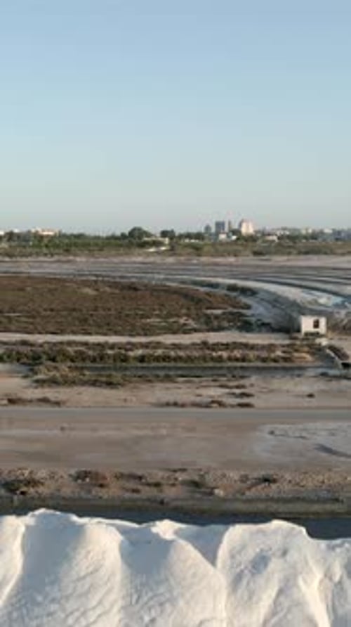 Aerial View Of Las Salinas De Torrevieja Salt Production Industry In Alicante Spain Drone Pullback