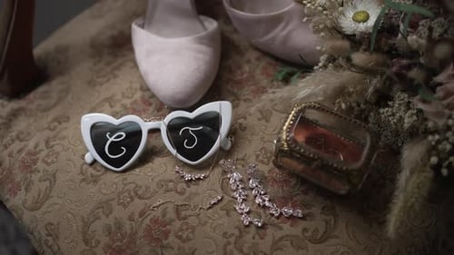 Wedding Accessories Displayed on an Upholstered Chair