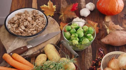 Preparing Thanksgiving Dinner on Rustic Wood Table