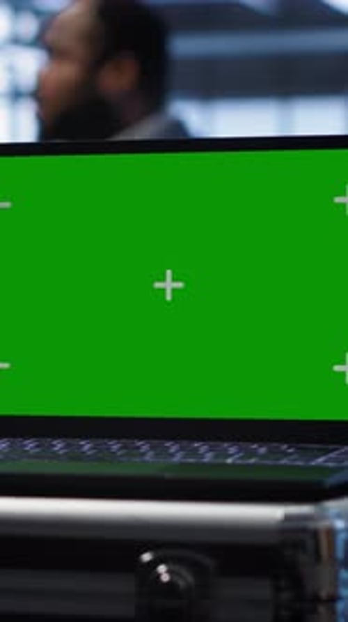 Vertical Video Mockup Laptop in Data Center Running Error Checking Software Monitoring Hardware
